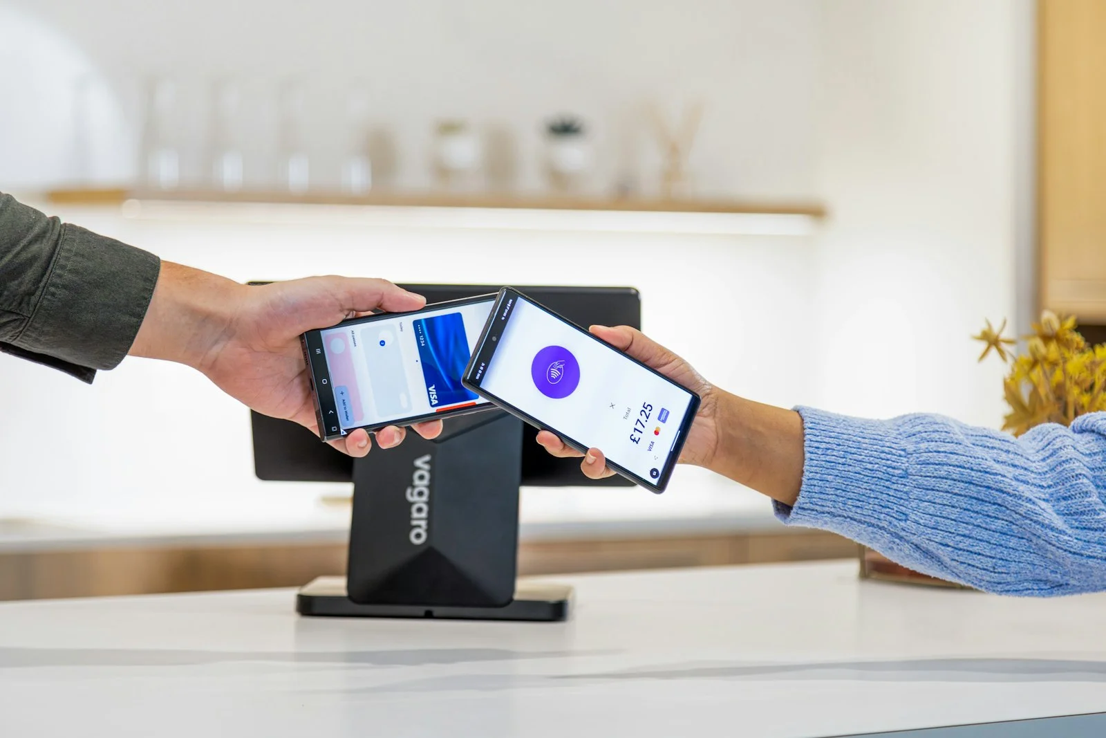 Mobile payment transaction being completed with phone Mobile payment transaction being completed with phone